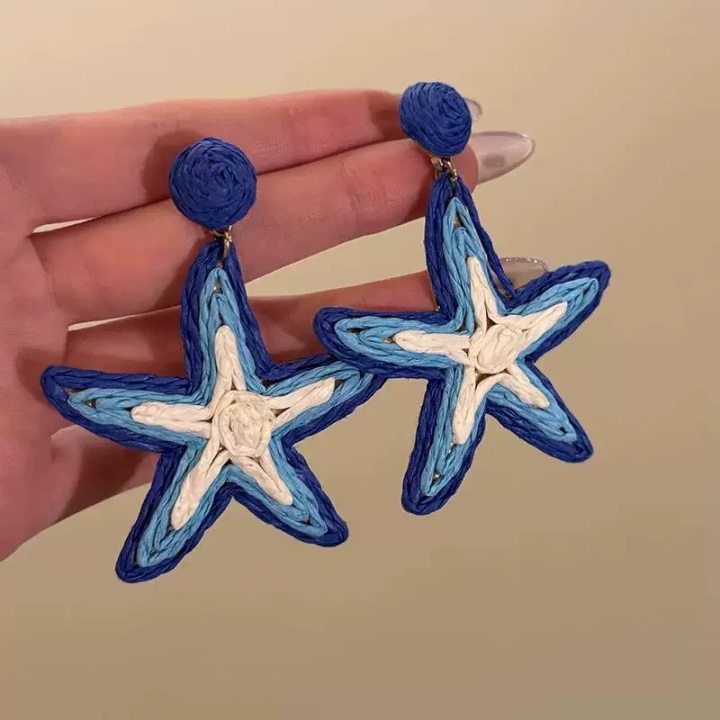 A girl with super fairy-like colorful flower earrings