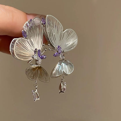 A girl with super fairy-like colorful flower earrings