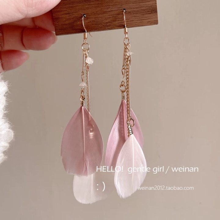 A girl with super fairy-like colorful flower earrings